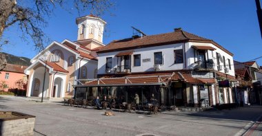 Customers sit at a cafe terrace in Valandovo, North Macedonia, Dec. 20, 2021. (AFP Photo)