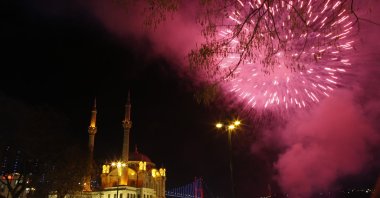 Fireworks explode over the Mecidiye mosque in Ortaköy Square, in Istanbul, Turkey, Jan. 1, 2022. (AP Photo)