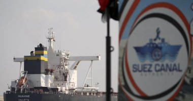 A cargo ship sails through the town of Ismailia, Egypt, March 30, 2021. (AP Photo)