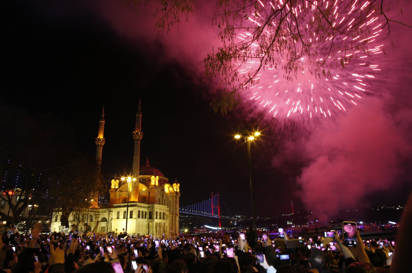 Fireworks explode over the Mecidiye mosque in Ortaköy Square, in Istanbul, Turkey, Jan. 1, 2022. (AP Photo)