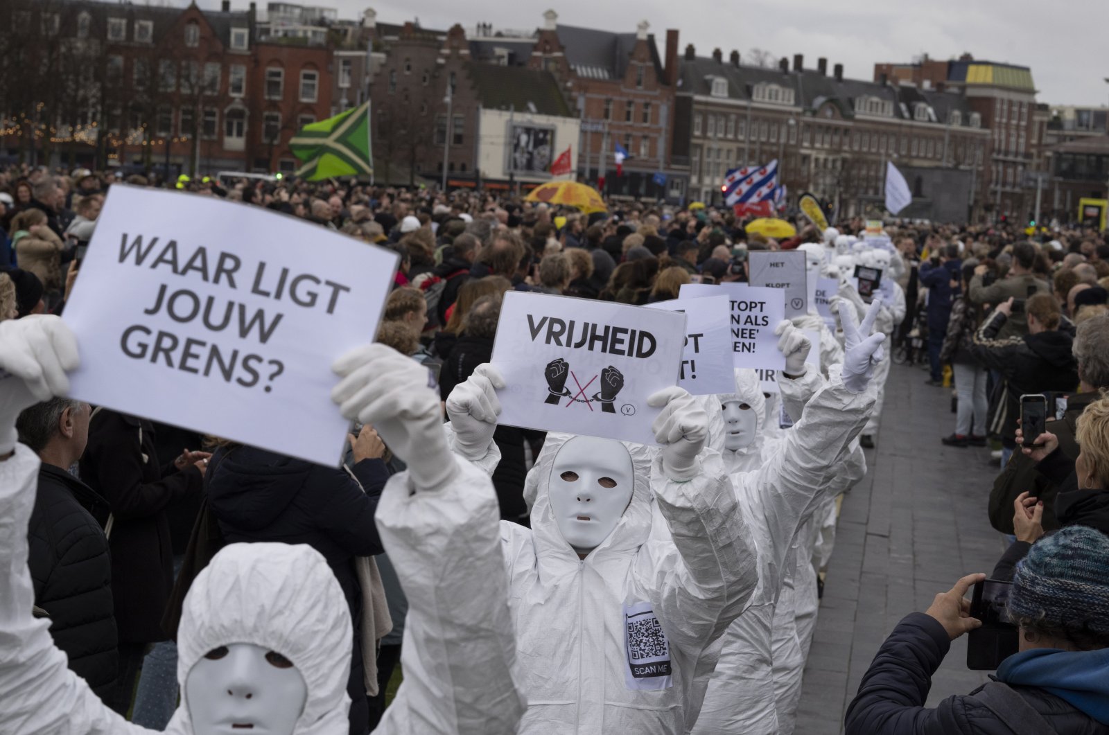 A sign reads &quot;Vrijheid&quot; or &quot;Freedom&quot; as thousands of people defied a ban to gather and protest the Dutch government&#039;s coronavirus lockdown measures, in Amsterdam, Netherlands, Jan. 2, 2022. (AP Photo)