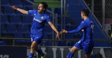 Getafe's Turkish forward Enes Ünal (L) celebrates after scoring in a La Liga match against Real Madrid, Getafe, Spain, Jan. 2, 2022. (AP Photo)