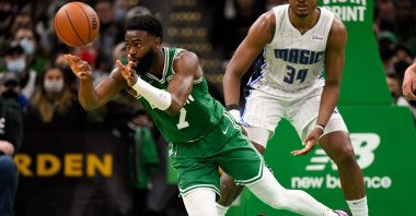 Boston Celtics guard Jaylen Brown (L) passes the ball during an NBA game against the Orlando Magic, Massachusetts, U.S., Jan 2, 2022. (Reuters Photo)