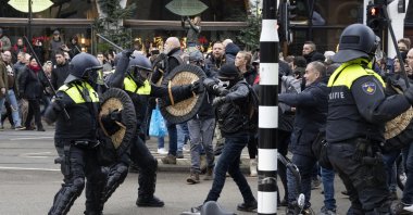 Police clash with demonstrators as thousands of people defied a ban Sunday to gather and protest the Dutch government&#039;s COVID-19 lockdown measures, Amsterdam, Netherlands, Jan. 2, 2022. (AP Photo)
