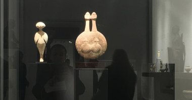 A view of a Stargazer idol (L) on display at Christie's auction house in New York, U.S., April 28, 2017. (AA PHOTO)