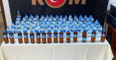 A police display of bootleg drinks seized in the Iskenderun district, in Hatay, southern Turkey, Jan. 1, 2022. (AA PHOTO)