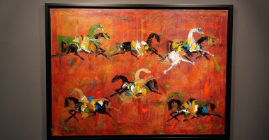 A painting by Fevzi Karakoç on display at the Istanbul Equestrian Club.