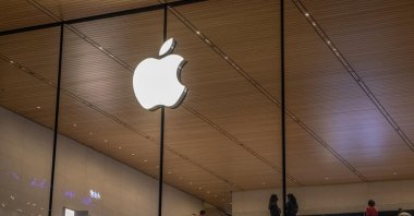People visit an Apple store at the Sanlitun shopping area in Beijing, China, Dec. 8, 2021. (EPA Photo)