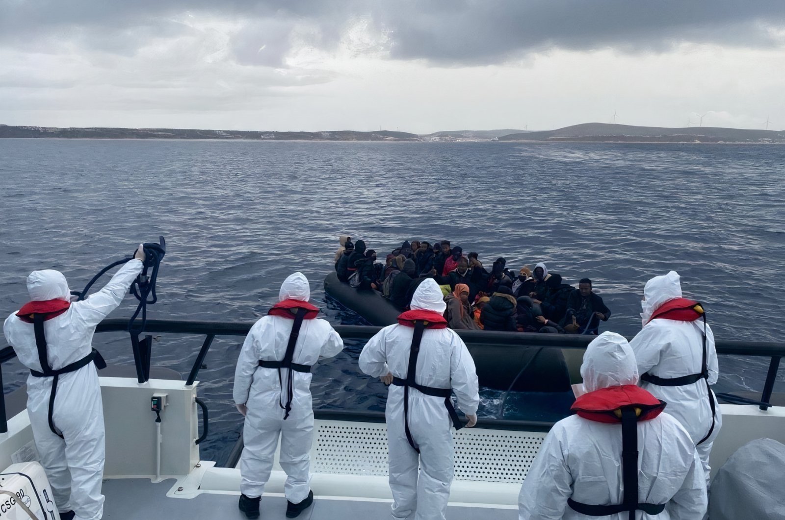 A coast guard unit rescued 68 migrants off Izmir province&#039;s Dikili district, Turkey, Dec. 31, 2021 (AA Photo)