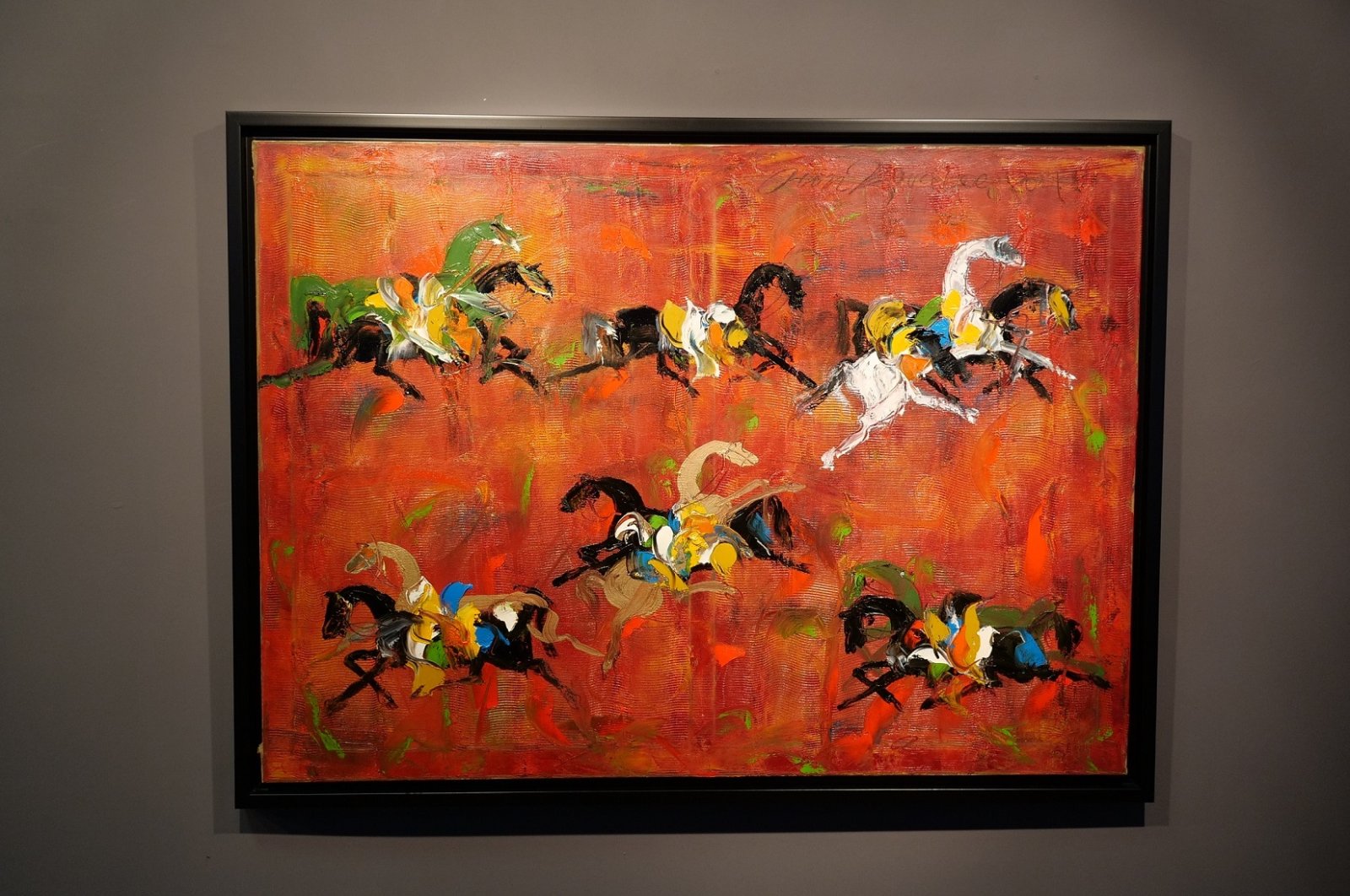 A painting by Fevzi Karakoç on display at the Istanbul Equestrian Club.