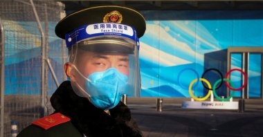 A paramilitary Police officer stands guard in a closed-loop area near a Beijing 2022 Winter Olympics venue, Beijing, China, Jan. 3, 2022. (Reuters Photo)