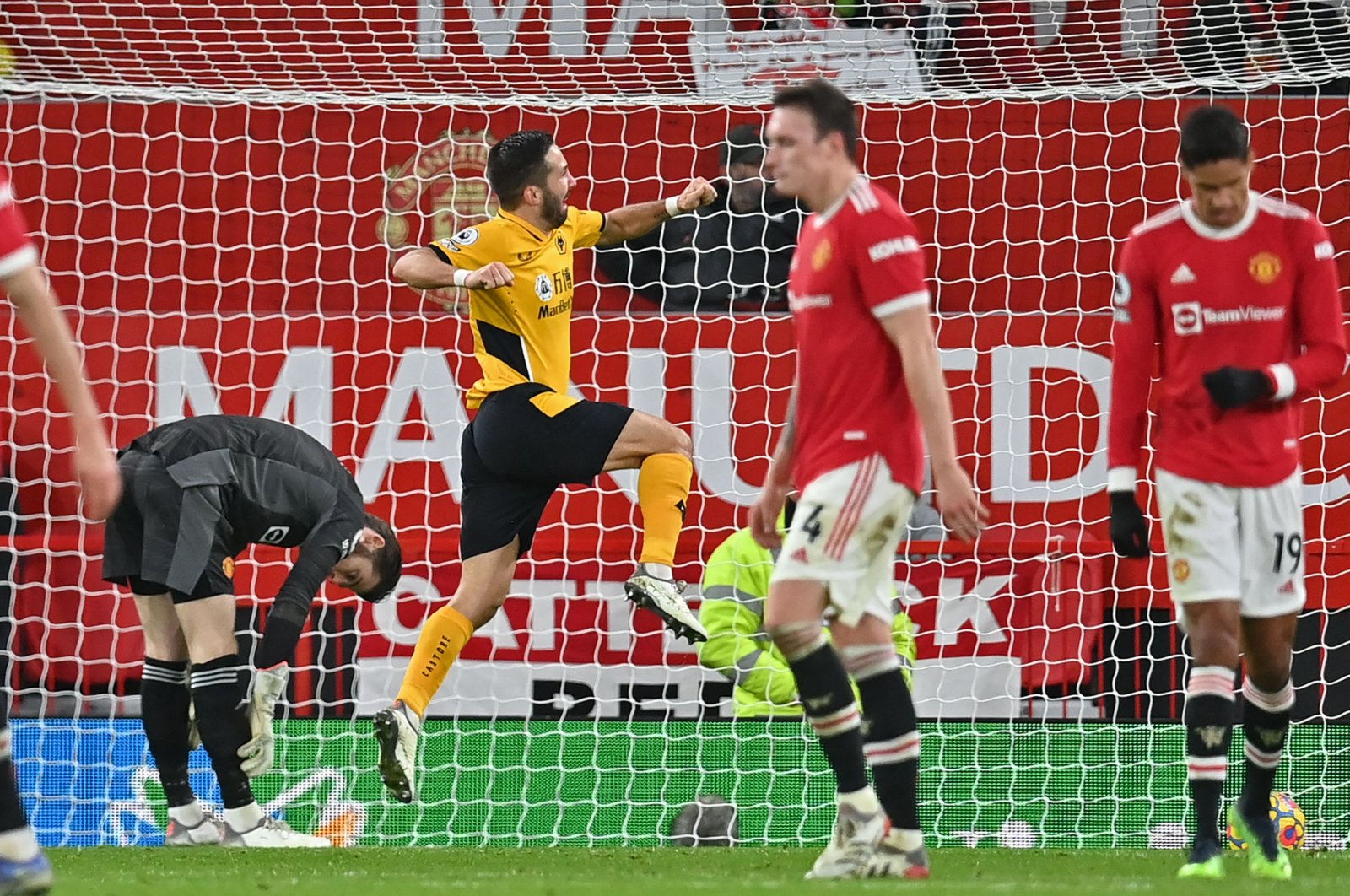 Wolverhampton Wanderers&#039; Joao Moutinho (C) celebrates after scoring in a Premier League match against Manchester United at Old Trafford in Manchester, England, Jan. 3, 2022. (AFP Photo)