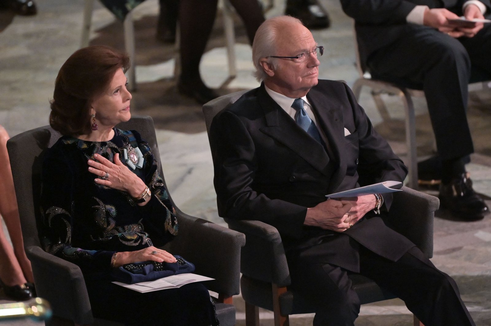 Sweden&#039;s King Carl XVI Gustaf and Queen Silvia attend a ceremony to pay tribute to the 2021 Nobel Prize laureates at the Stockholm City Hall in Stockholm, Sweden, Dec. 10, 2021. (AFP Photo)