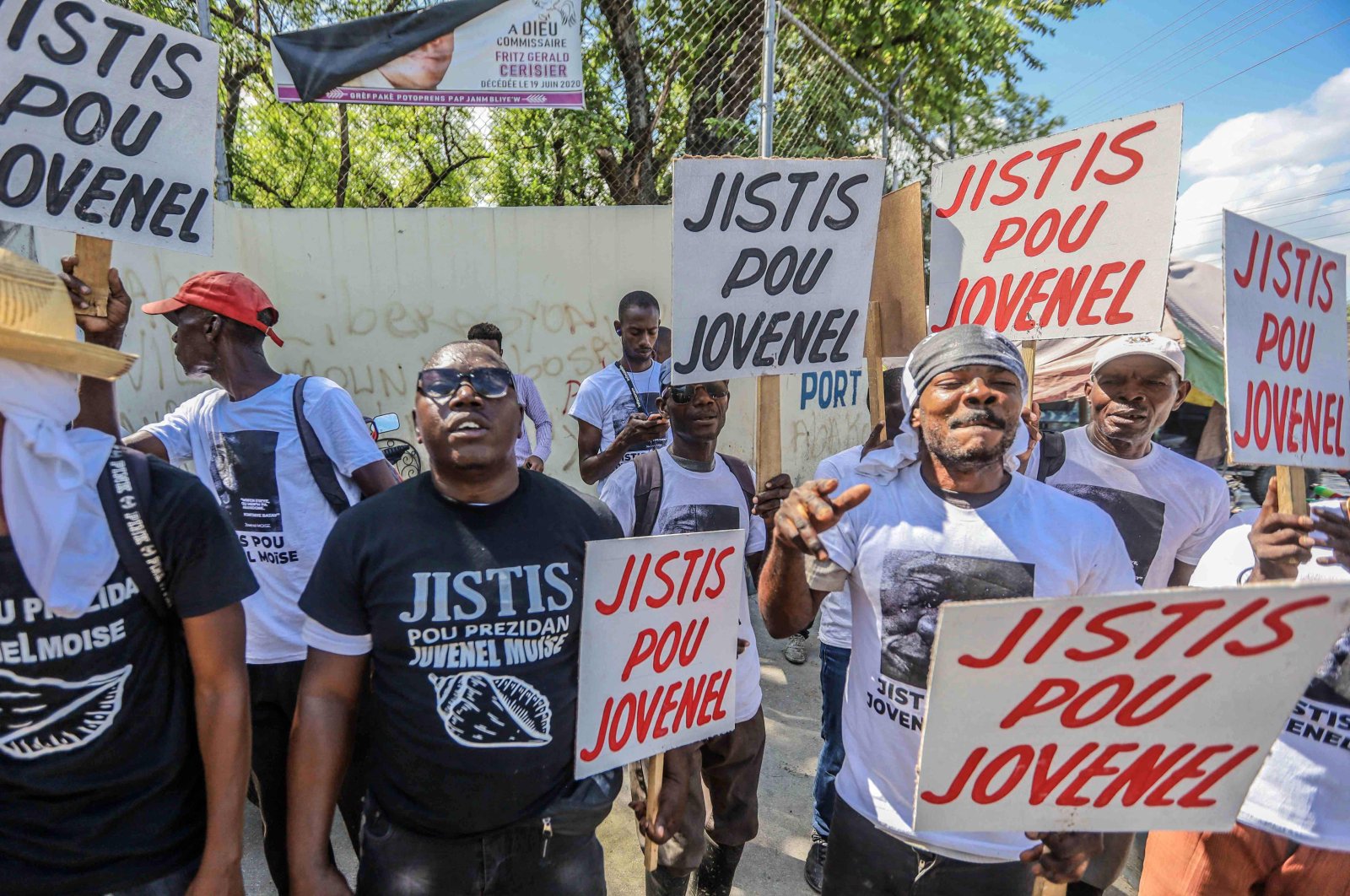 A group of activists demands justice for former Haitian President Jovenel Moise, as Martine Moise is interviewed as a witness by the judge investigating his assassination in Port-au-Prince, Haiti, Oct. 6, 2021. (AFP Photo)