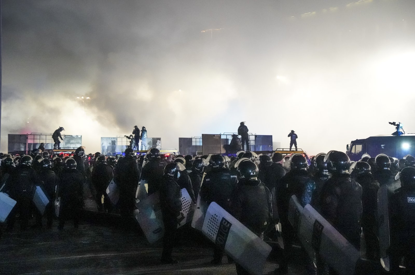 Riot police block protesters in the center of Almaty, Kazakhstan, Wednesday, Jan. 5, 2022. (AP Photo)