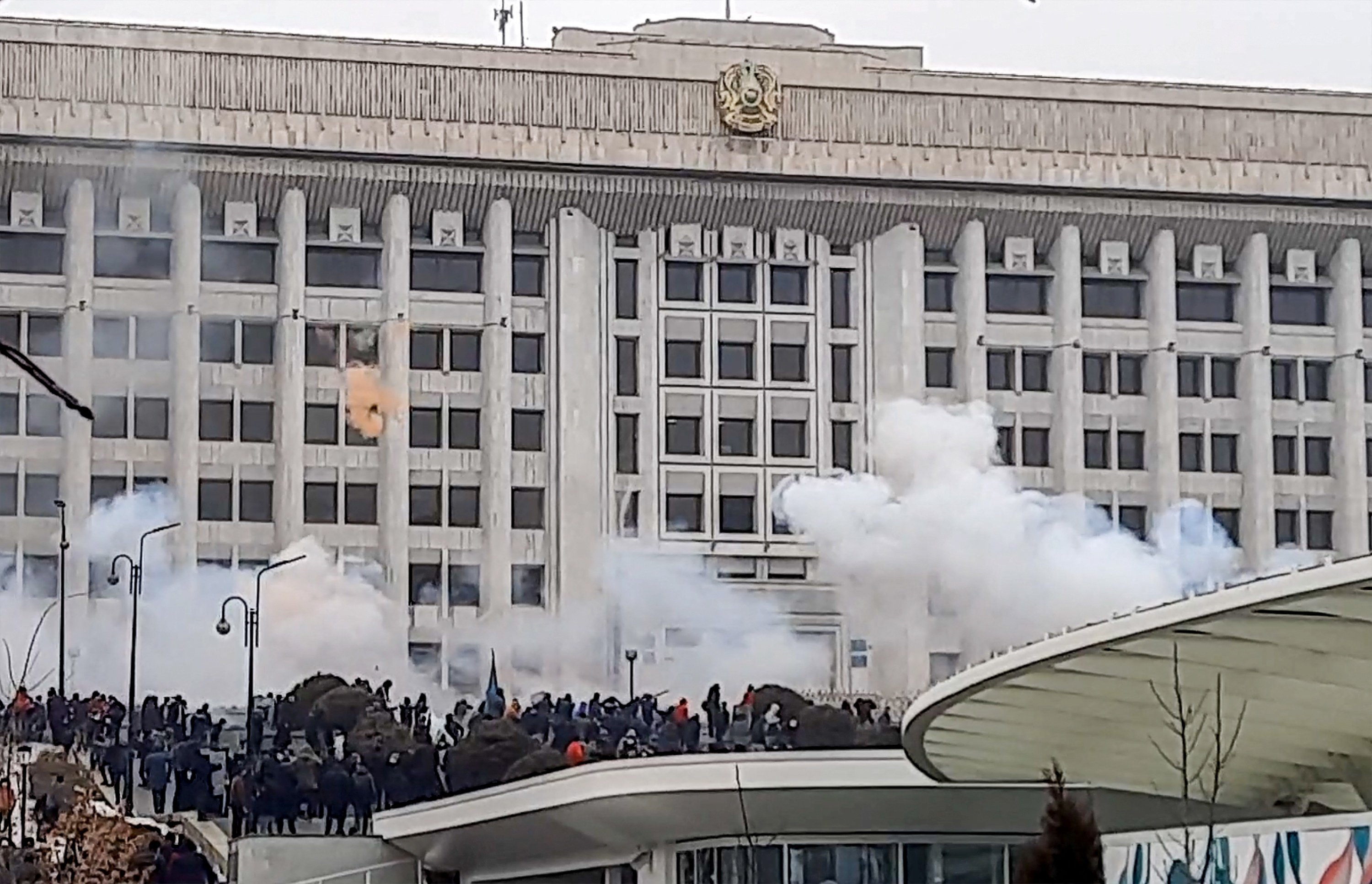 This image grab shows protesters near an administrative building during a rally over a hike in energy prices in Almaty, Kazakhstan, Jan. 5, 2022. (AFP Photo)
