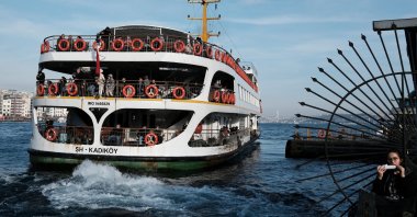 People travel on a ferry over the Bosporus in Istanbul, Turkey, Jan. 3, 2022. (Reuters Photo)
