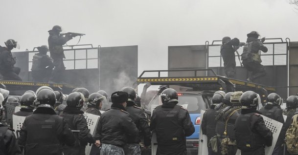Riot police officers patrol in a street during rally over a hike in energy prices in Almaty, Kazakhstan, Jan. 5, 2022. (EPA Photo)