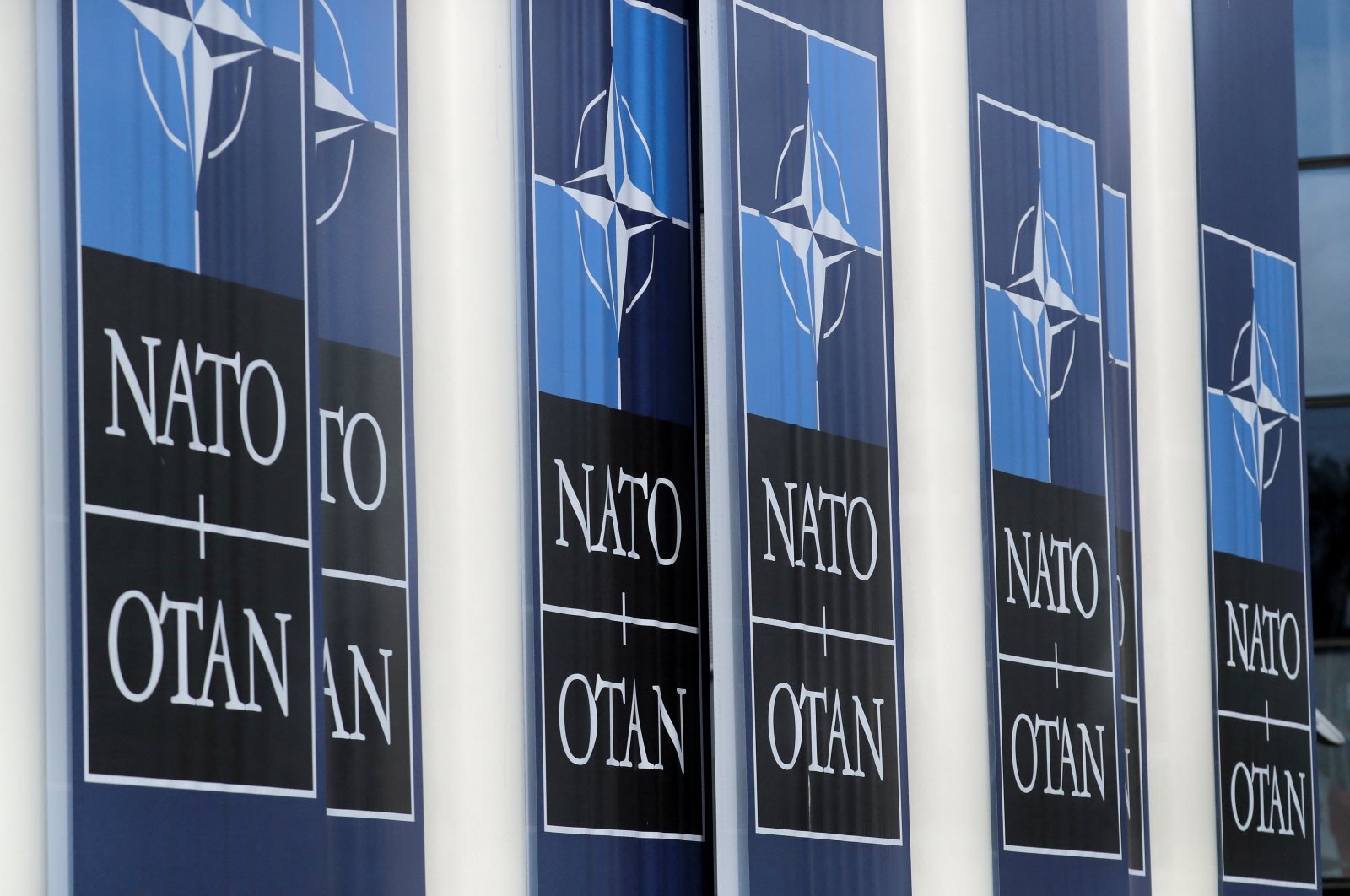 NATO logos are seen at the alliance headquarters ahead of a NATO defense ministers meeting, in Brussels, Belgium, Oct. 21, 2021. (Reuters Photo)