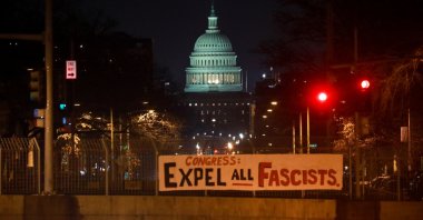 A banner reading "Congress: Expel All Fascists" can be seen unfurled in front of the U.S. Capitol, Washington, D.C., U.S., Jan. 6, 2021. (Photo by AA)