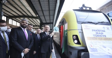 Turkey&#039;s Transport and Infrastructure Minister Adil Karaismailoğlu (R) and Member of Pakistani lawmaker Makhdoom Zain Hussain Qureshi (2nd L) during a ceremony to mark the arrival of Islamabad-Tehran-Istanbul train, Ankara, Turkey, Jan. 5, 2022. (AA Photo)
