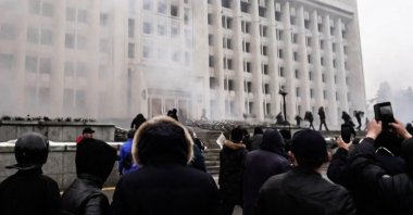 A frame grab taken on January 6, 2022, from an AFPTV video made on January 5, 2022, shows protesters storming in the city hall of Kazakhstan&#039;s largest city Almaty as unprecedented unrest in the Central Asian nation spins out of control due to a hike in energy prices. (AFP Photo)