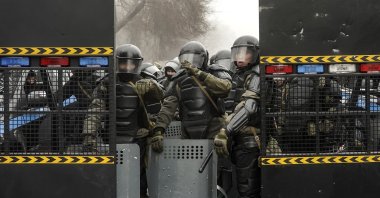 Riot police officers block a street during a protest rally over a hike in energy prices in Almaty, Kazakhstan, Jan. 5, 2022. (EPA Photo)