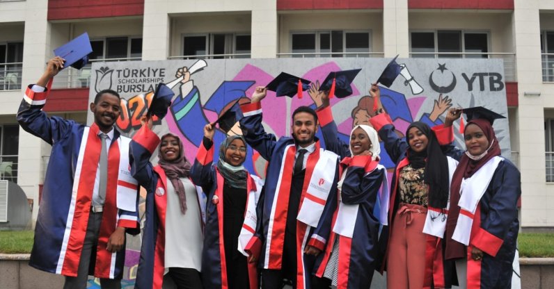 Türkiye Scholarships students celebrate graduation on the sidelines of a ceremony in the capital Ankara, Turkey, July 8, 2021. (COURTESY OF YTB)