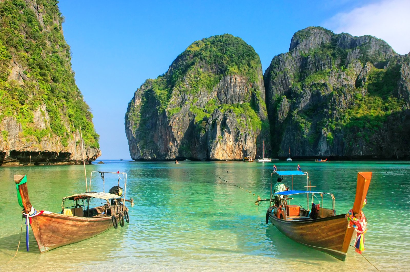 Over-tourism in Maya Bay in Thailand led to massive coral damage after the area was made famous by the 2000 film &quot;The Beach.&quot; (Shutterstock Photo)