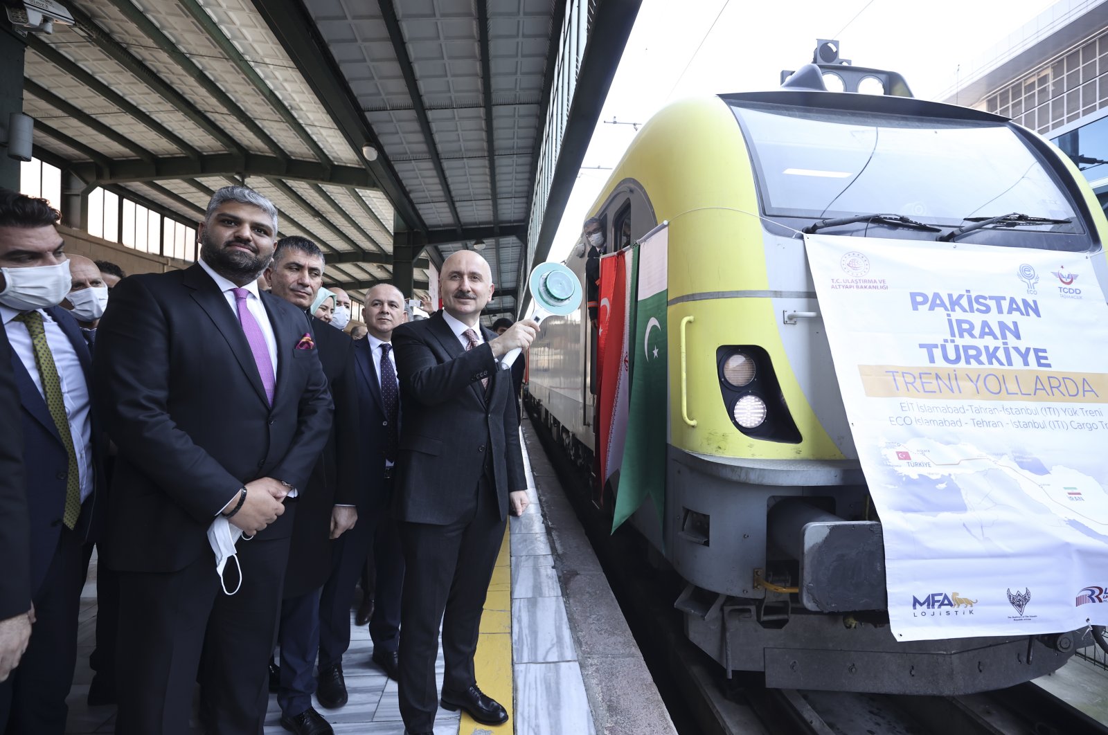 Turkey&#039;s Transport and Infrastructure Minister Adil Karaismailoğlu (R) and Member of Pakistani lawmaker Makhdoom Zain Hussain Qureshi (2nd L) during a ceremony to mark the arrival of Islamabad-Tehran-Istanbul train, Ankara, Turkey, Jan. 5, 2022. (AA Photo)