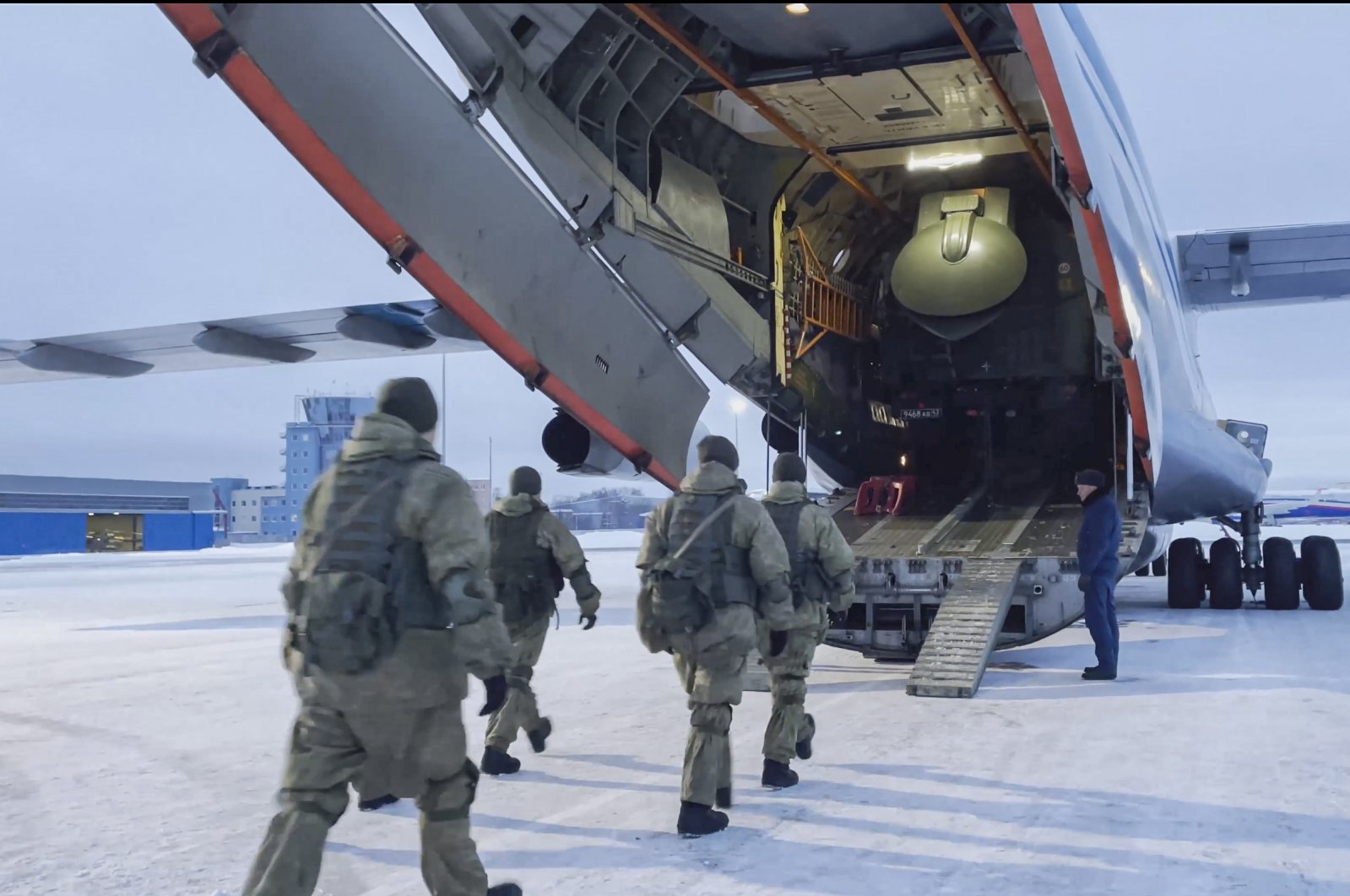A still image taken from a handout video made available by the Russian Defense Ministry&#039;s press service shows Russian officers boarding military aircraft on their way to Kazakhstan, at an airfield outside Moscow, Russia, Jan. 6, 2022. (EPA Photo)