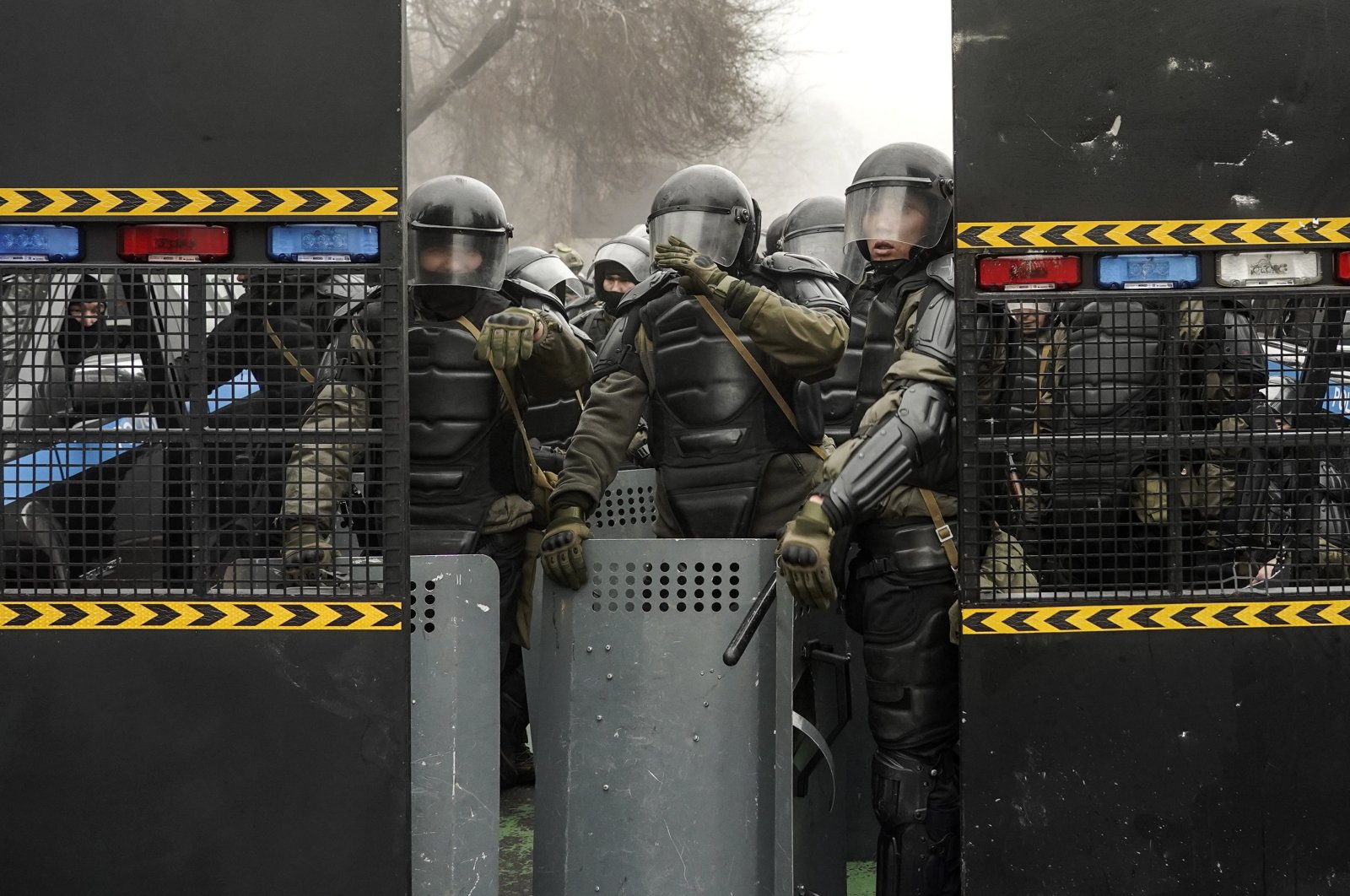 Riot police officers block a street during a protest rally over a hike in energy prices in Almaty, Kazakhstan, Jan. 5, 2022. (EPA Photo)