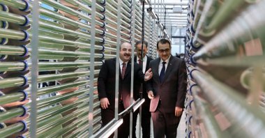 Minister of Industry and Technology Mustafa Varank (L) and Minister of Energy and Natural Resources Fatih Dönmez tour the refinery, in Istanbul, Turkey, Jan. 7, 2022. (AA PHOTO) 