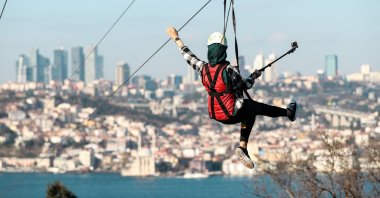 Adventure lovers in Istanbul can now feel their hearts race while ziplining and taking in a dazzling view of the Bosporus at the same time. (AA Photo)