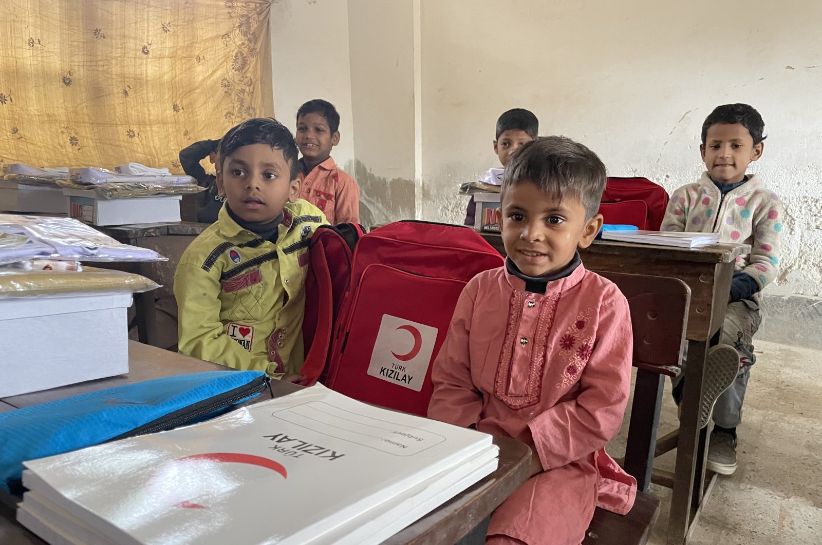 Rohingya students taking classes in Karachi receive educational materials from the Turkish Red Crescent, Karachi, Pakistan, Jan. 6, 2022. (AA Photo)