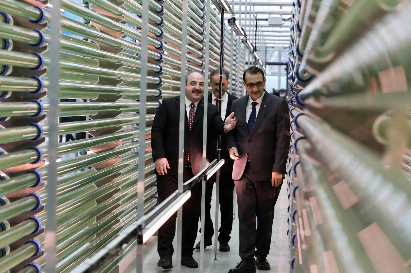 Minister of Industry and Technology Mustafa Varank (L) and Minister of Energy and Natural Resources Fatih Dönmez tour the refinery, in Istanbul, Turkey, Jan. 7, 2022. (AA PHOTO) 