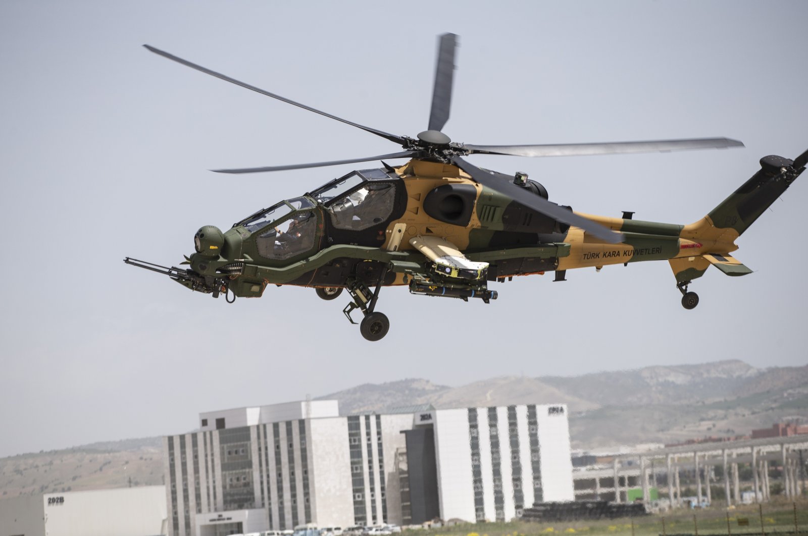 The T129 Tactical Reconnaissance and Attack Helicopter (ATAK) flies over the capital Ankara, Turkey, May 19, 2020. (AA Photo)
