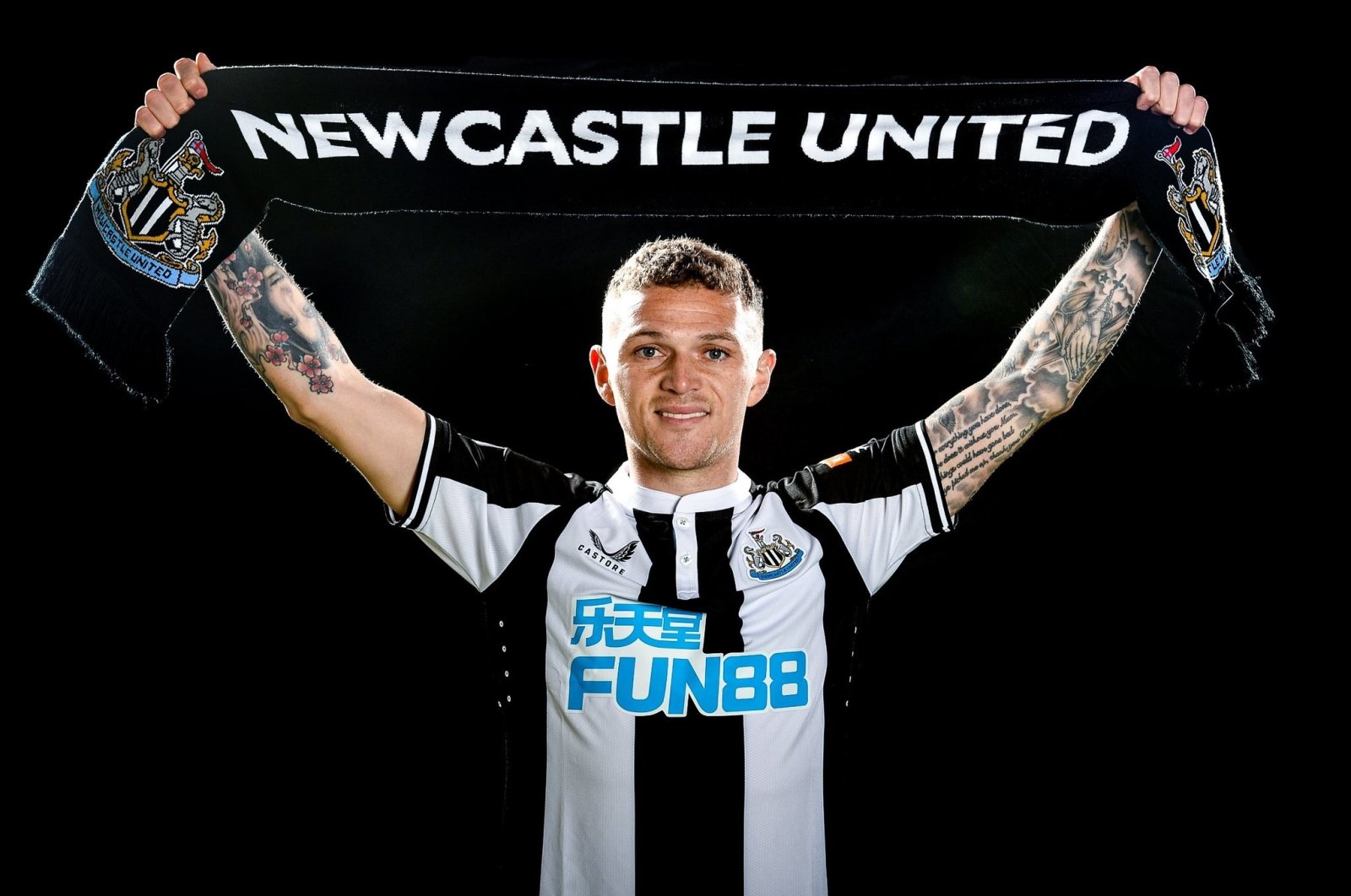English footballer Kieran Trippier poses in Newcastle shirt after signing for the club, Newcastle, England, Jan. 7, 2022. (IHA Photo)