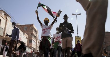 People chant slogans during a protest to denounce the October 2021 military coup, in Khartoum, Sudan, Jan. 6, 2022. (AP Photo)