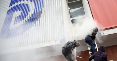 Protesters break into the headquarters of the Democratic Party in Tirana, Albania, Jan. 8, 2022. (EPA Photo)