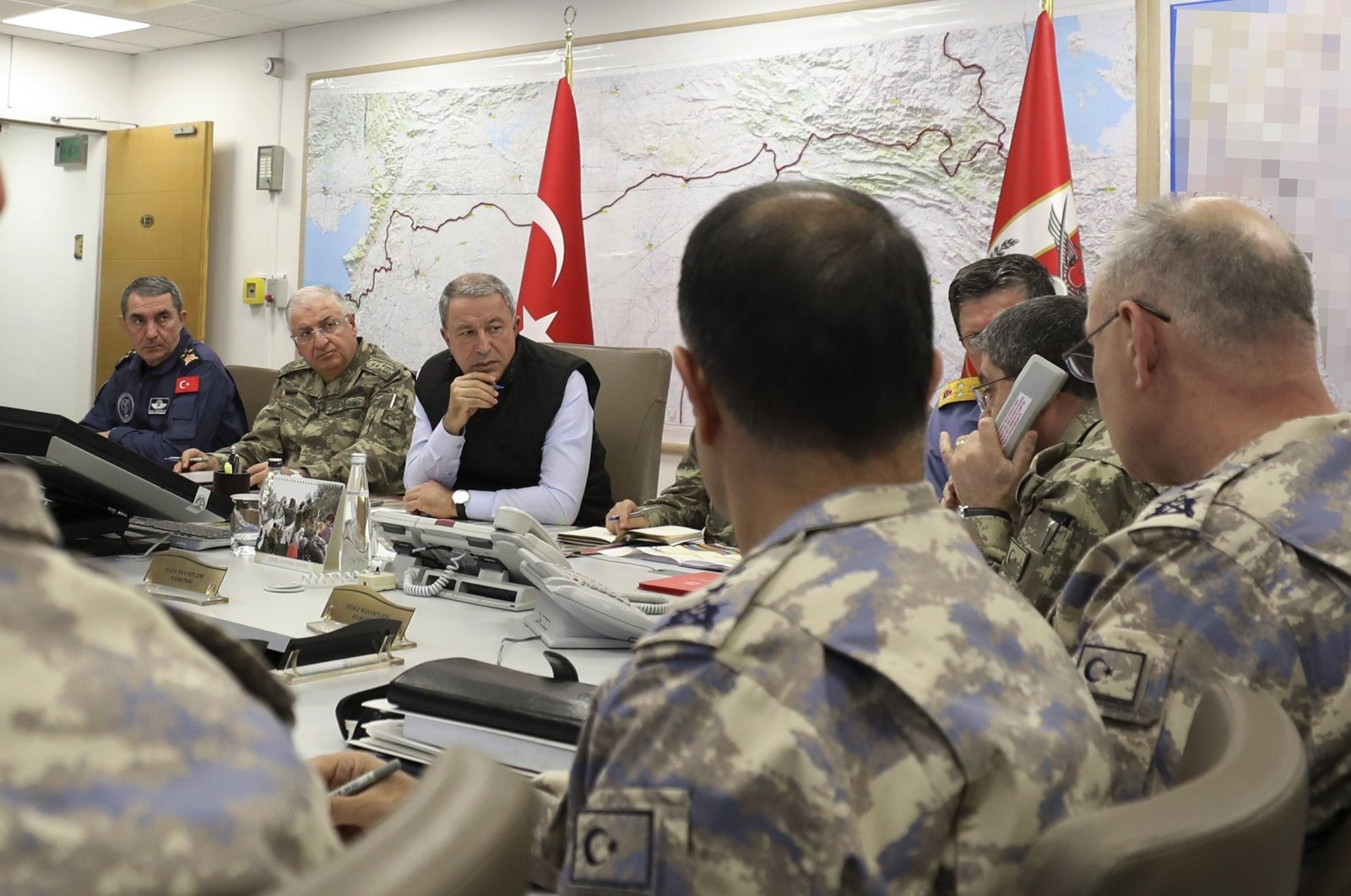 Defense Minister Hulusi Akar (C) with the Turkish army&#039;s top commanders in an operation room at the army headquarters, Ankara, Turkey, Oct. 9, 2019. (Defense Ministry Photo)