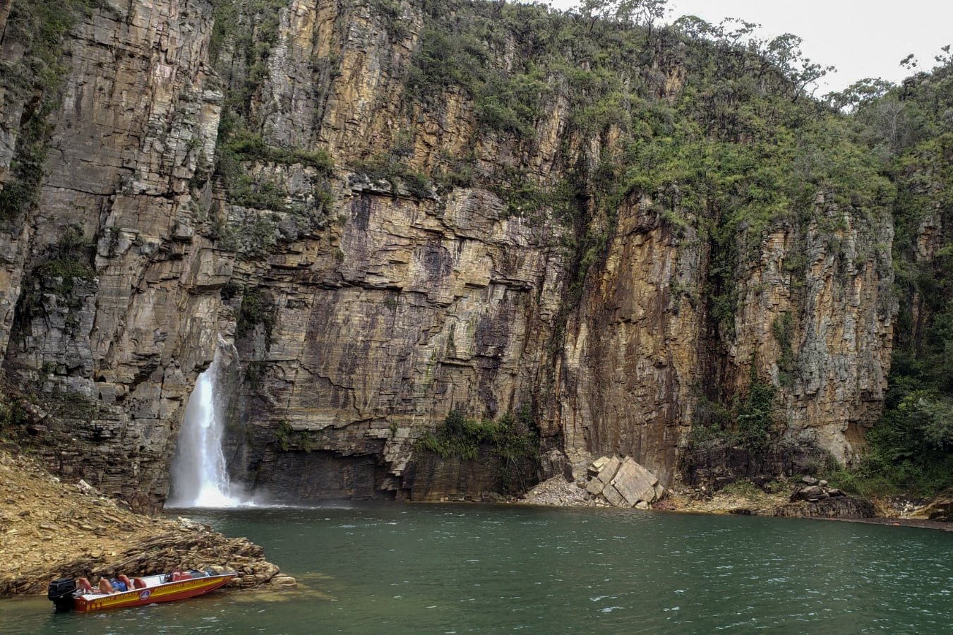 This handout picture released by Minas Gerais Fire Department shows the area where a large rock fragment broke off a ravine and plunged onto several tourist boats, leaving at least 10 people dead, at the canyons of Furnas Lake, city of Capitolio, Minas Gerais state, Brazil, Jan. 8, 2022. (AFP Photo/Minas Gerais Fire Department)