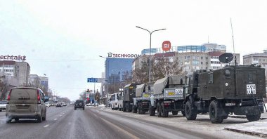 Kazakh military vehicles (R) parked at an area in downtown Nur-Sultan, the capital city of Kazakhstan, Jan. 8, 2022. (EPA Photo)