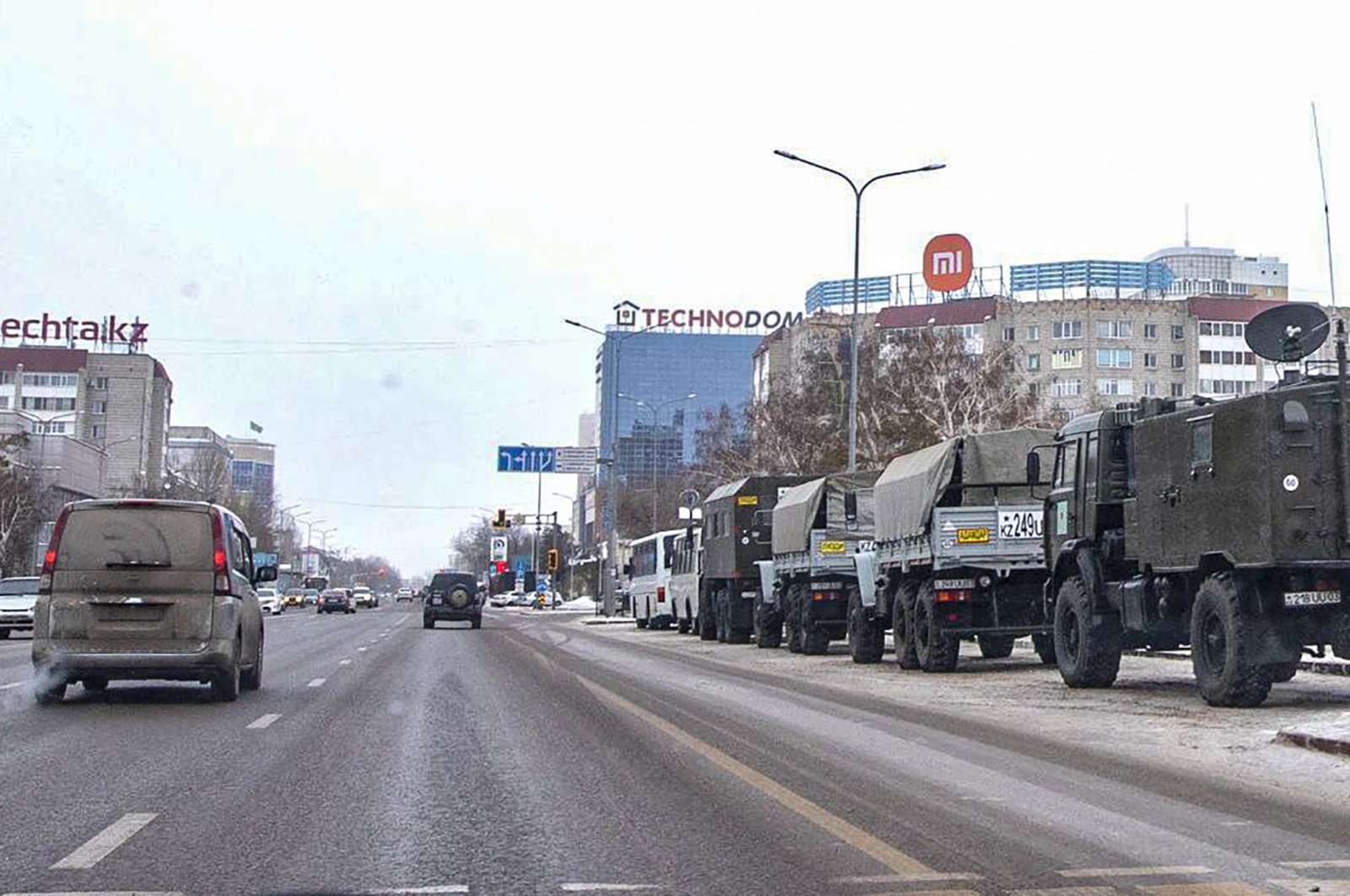 Kazakh military vehicles (R) parked at an area in downtown Nur-Sultan, the capital city of Kazakhstan, Jan. 8, 2022. (EPA Photo)