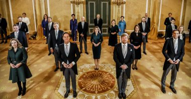 King Willem-Alexander poses with Dutch Prime Minister Mark Rutte and his fourth cabinet, following the swearing-in and inauguration ceremony of the new government, at Noordeinde Palace in The Hague, the Netherlands, on Jan. 10, 2022. (AFP Photo)