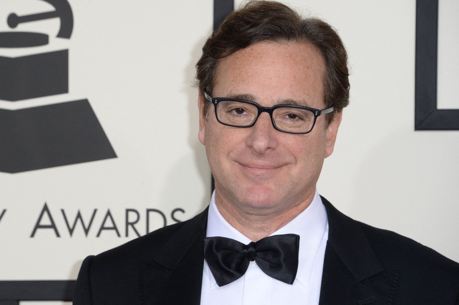 Bob Saget arrives on the red carpet for the 56th Grammy Awards at the Staples Center in Los Angeles, California, U.S., Jan. 26, 2014. (AFP Photo)