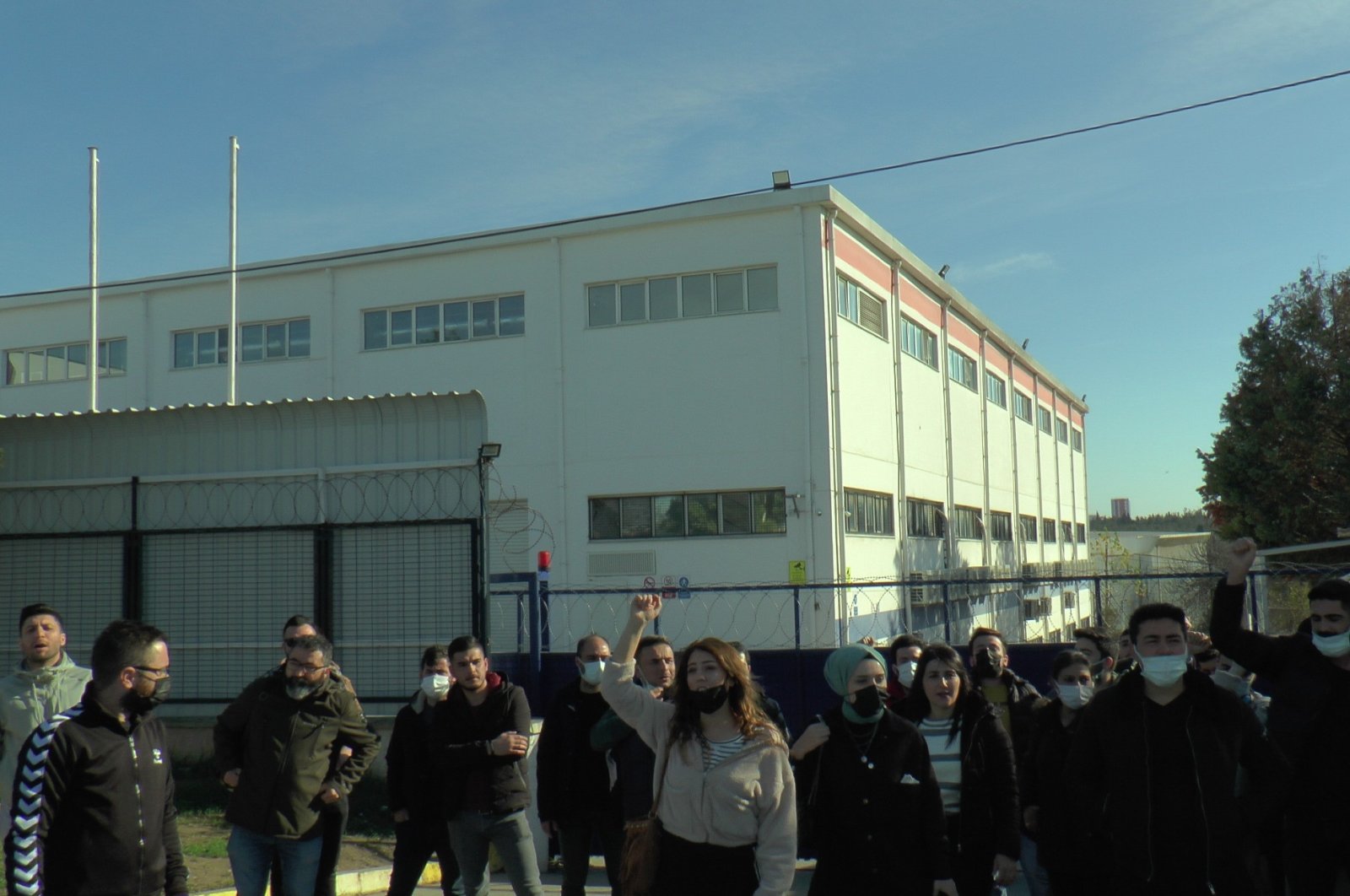 Laid-off employees protest in front of the Oppo factory in Tuzla, Istanbul, Turkey, Jan. 10, 2022. (IHA Photo)