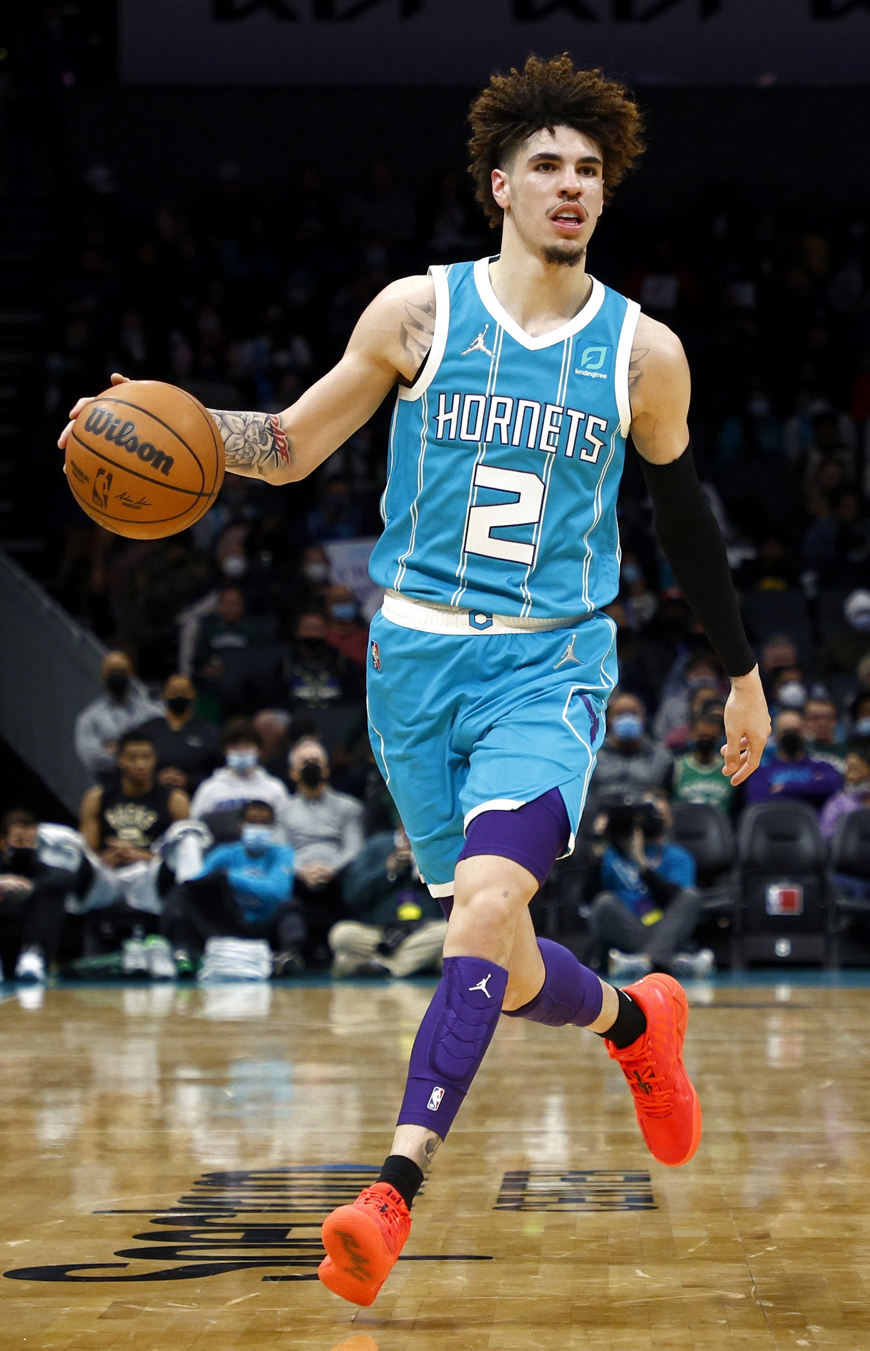 Charlotte Hornets' LaMelo Ball brings the ball up court during an NBA game against the Milwaukee Bucks, Charlotte, North Carolina, U.S., Jan. 10, 2022. (AFP Photo)