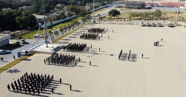 Members of Libya&#039;s maritime forces parade during the reopening ceremony of the Libyan Academy of Maritime Studies, after it was closed down for more than a decade, Tripoli, Libya, Dec. 22, 2021. (AFP File Photo)