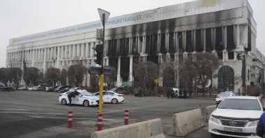 A view of the Media center building after clashes in the central square blocked by Kazakhstan troops and police in Almaty, Kazakhstan, Tuesday, Jan. 11, 2022. Life in Almaty, which was affected with the violence the most during protests, started returning to normal this week, with public transport resuming operation and malls reopening. (Vladimir Tretyakov/NUR.KZ via AP)